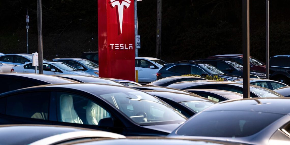 Tesla earnings drop